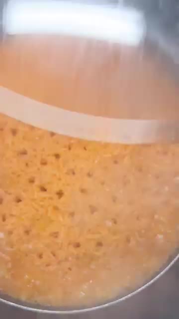치킨 육수를 붓고 뚜껑을 덮어 밥을 익힌다. — Salmon, Cheese & Rice Tacos?! A Disrespectfully Good Fusion